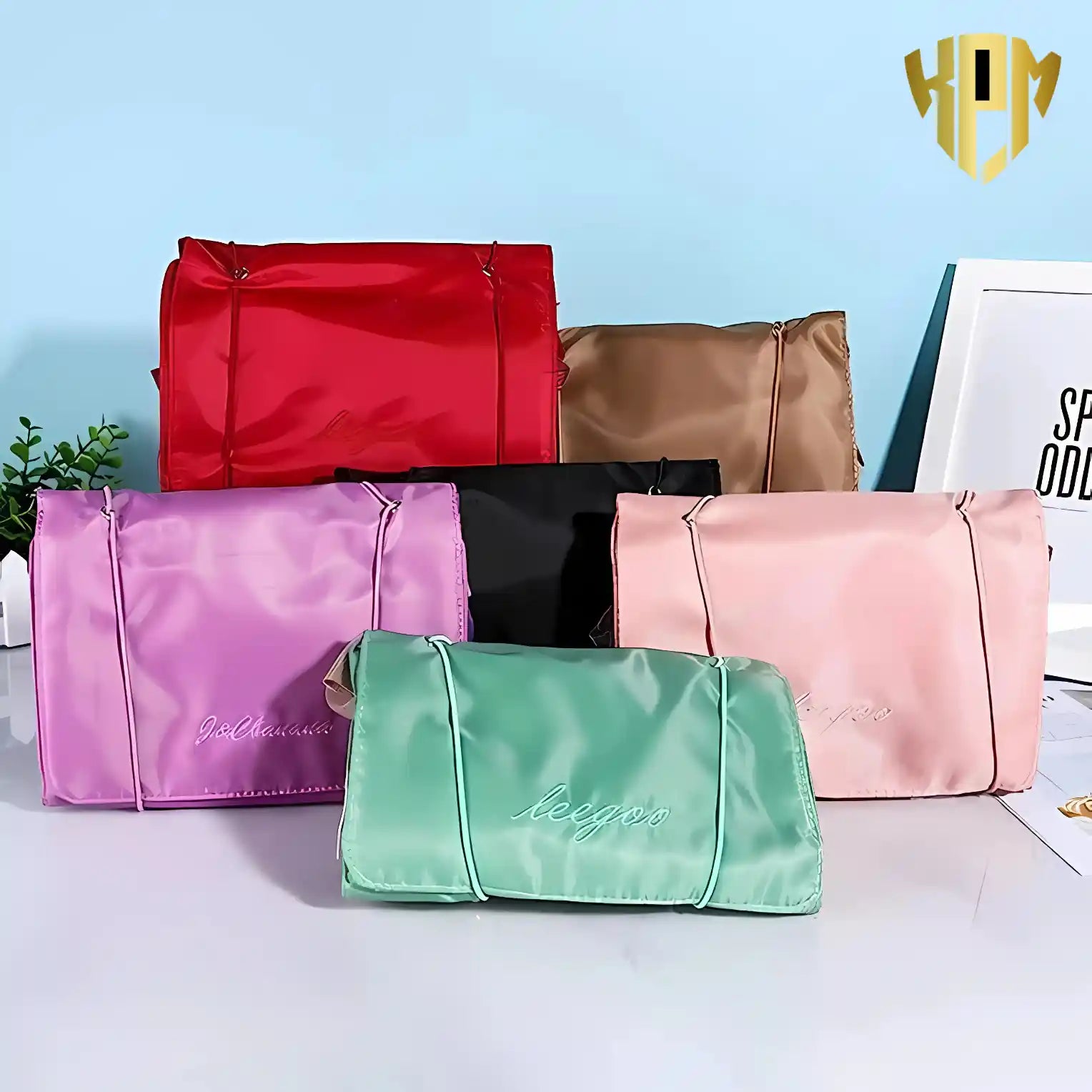 KPM WORLD™ 4-in-1 hanging roll-up makeup organizer available in multiple stylish colors including khaki, mint green, pink, purple, and red.