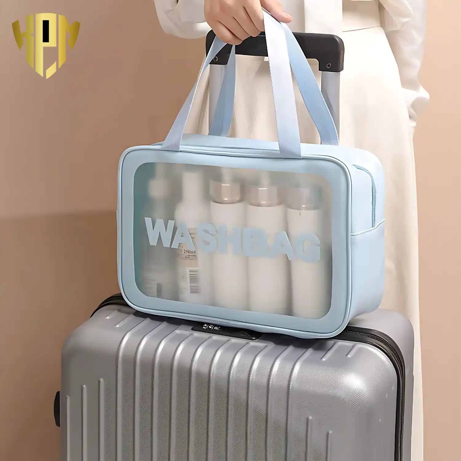 KPM WORLD™ premium blue travel wash bag placed on a suitcase, ideal for carrying toiletries, skincare products, cosmetics, and travel essentials during trips.