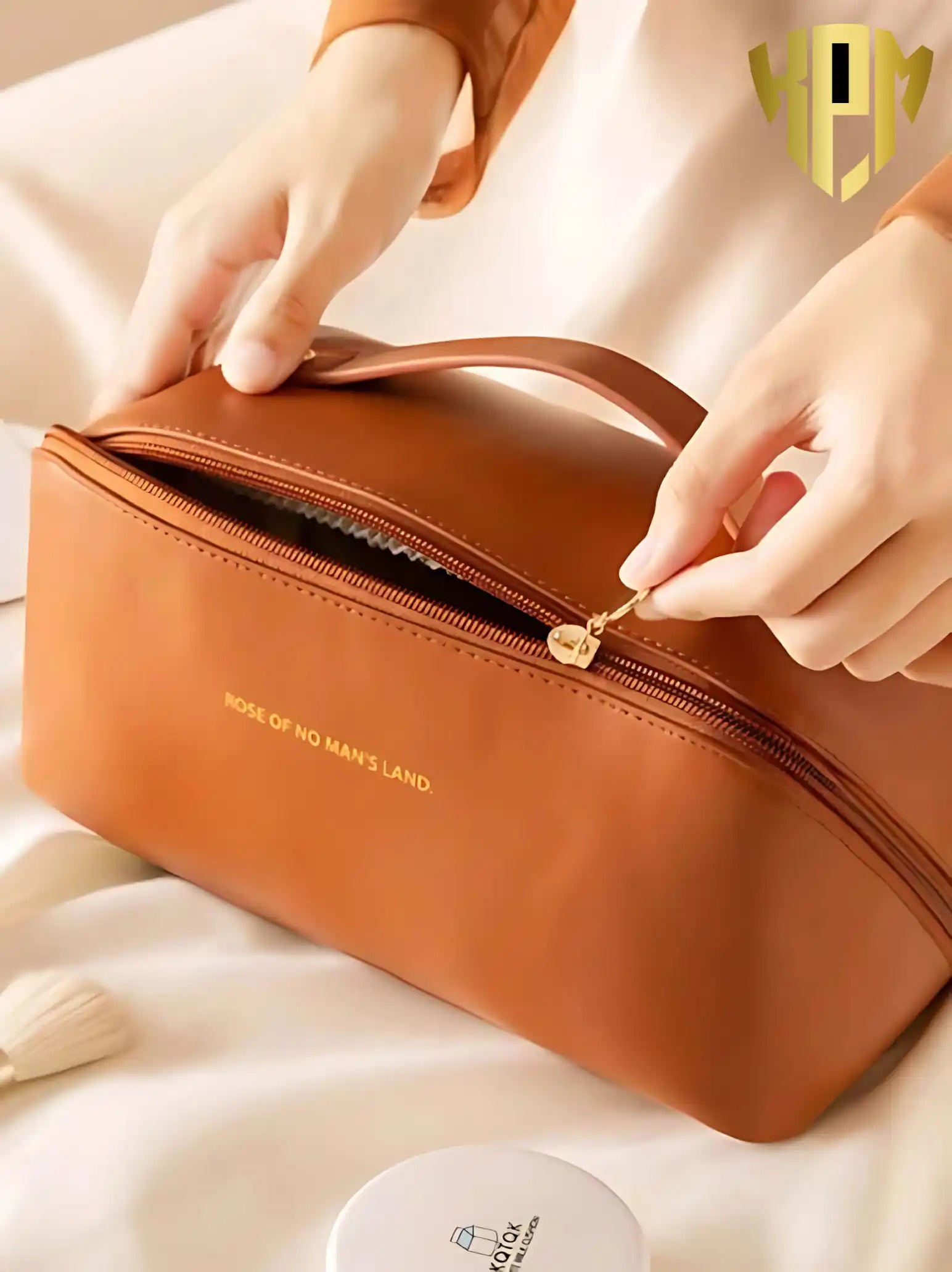 KPM WORLD™ premium brown PU leather makeup bag with smooth dual zipper closure, comfortable top handle, and durable travel-friendly construction.