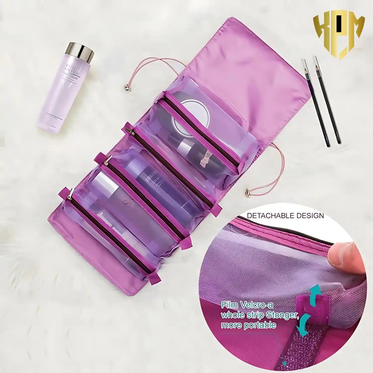 KPM WORLD™ purple hanging cosmetic organizer displaying detachable transparent storage compartments for organized travel essentials.