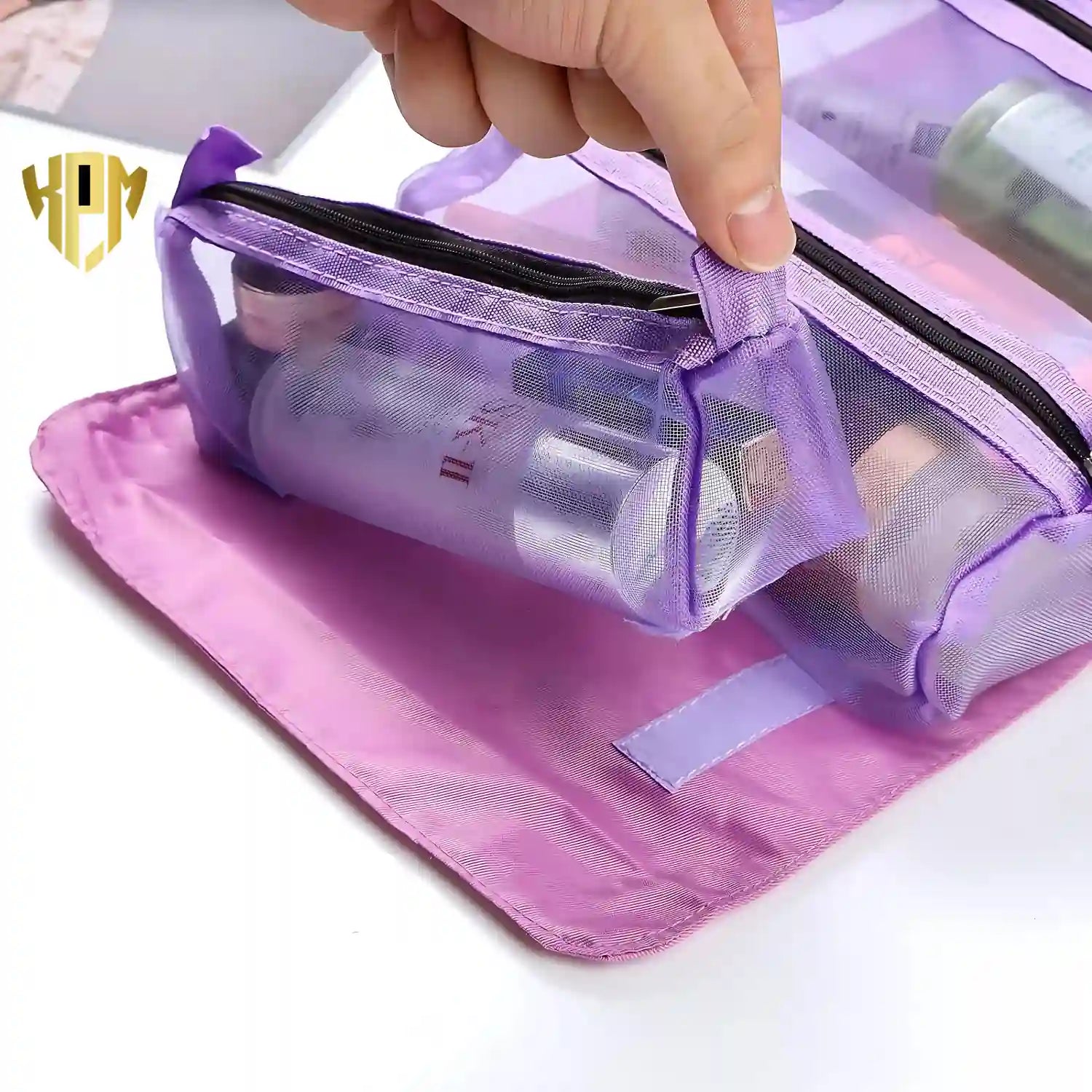 Close-up of the KPM WORLD™ purple detachable transparent mesh pouch with secure hook-and-loop attachment for easy removal and organization.